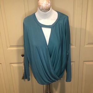 Women’s retro blouse size large in deep teal with wrap and Décolleté detail.